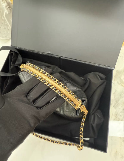 Chanel 24A black leather gold hardware top handle bag