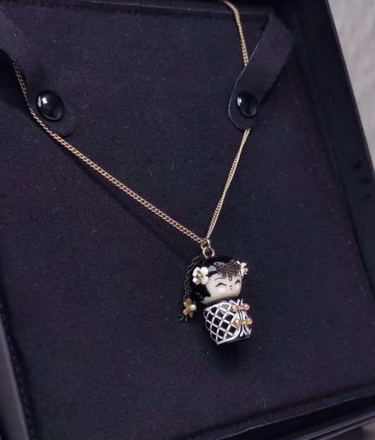 Chanel 10A Double C Acrylic Porcelain Doll Necklace