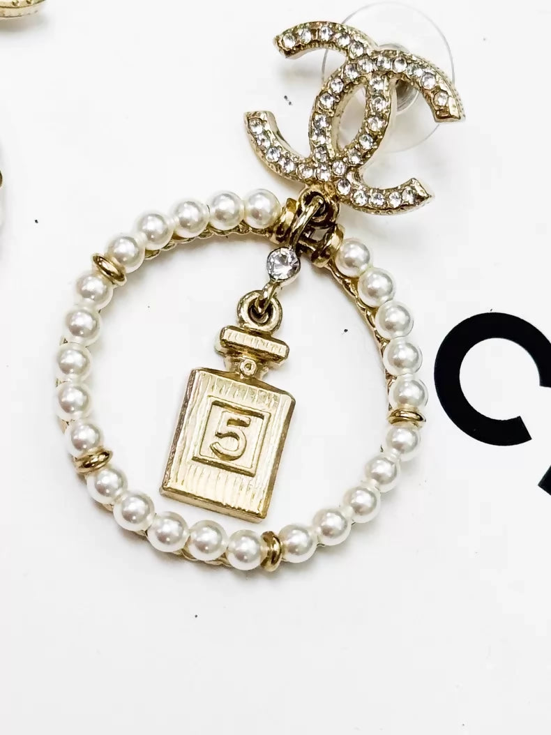 Chanel gold circle pearl pendant earrings