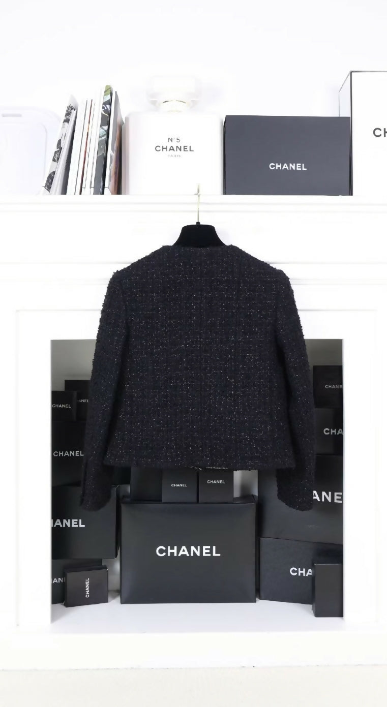 Chanel 21K black tweed diamond-button four-pocket jacket