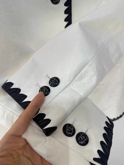 Chanel 21C black and white classic leather jacket