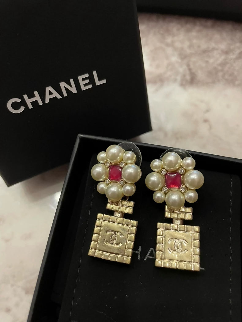 Chanel 21P floral perfume bottle earrings