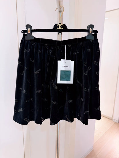 Chanel 22B Black Sequined Logo Bow Skirt