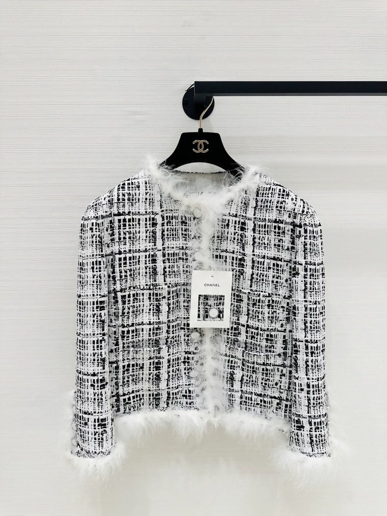 Chanel 25S black and white tweed jacket