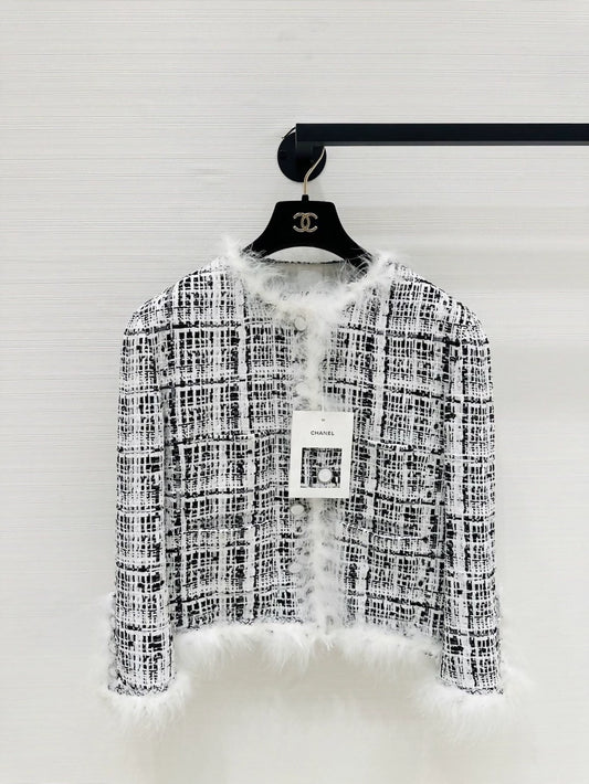 Chanel 25S black and white tweed jacket