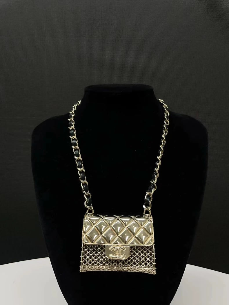 Chanel Spring/Summer 2021 mini bag necklace in leather and metal chain