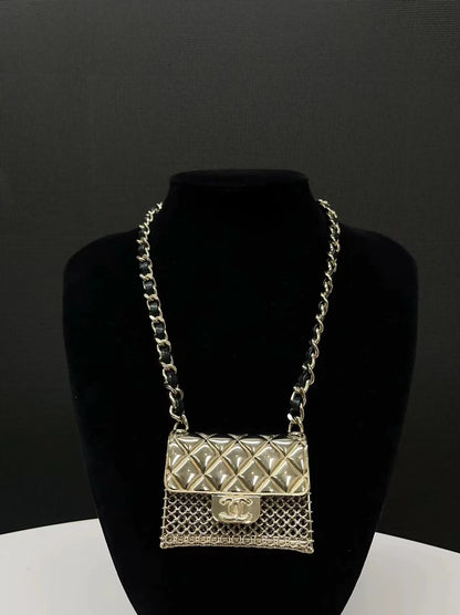 Chanel Spring/Summer 2021 mini bag necklace in leather and metal chain