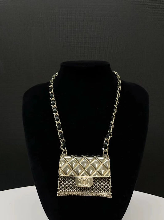 Chanel Spring/Summer 2021 mini bag necklace in leather and metal chain