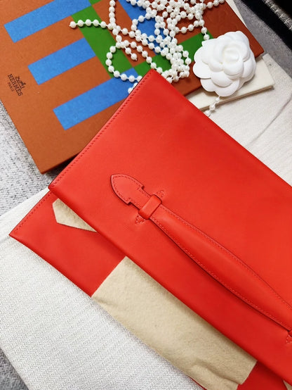 Hermes Pochette Pliplat red clutch