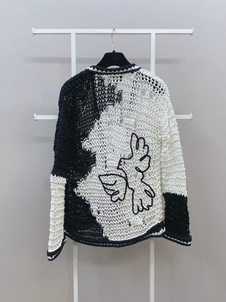 CHANEL 22C "Dove of Peace" white and black cardigan