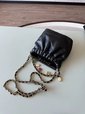 Chanel 23P black leather bag with Charms