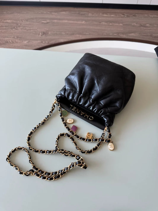 Chanel 23P black leather bag with Charms