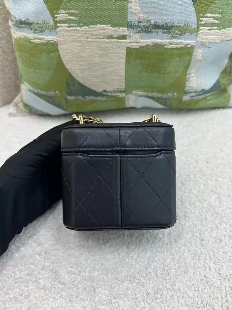 Chanel 23B black and gold mini square lipstick bag