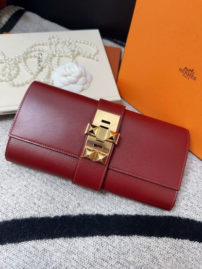 Hermes red Medor clutch gold hardware