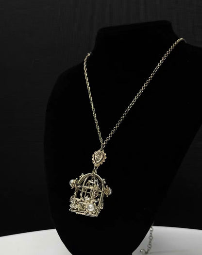 Chanel 22k birdcage necklace