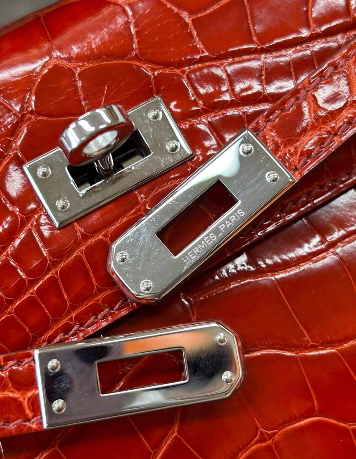 Hermès Kelly Pochette Braise Red Shiny Alligator Palladium
