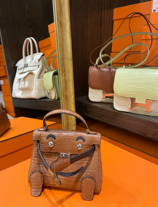 Hermès Matte Gold Alligator and Ebene Swift Quelle Idole Kelly Doll Palladium Hardware