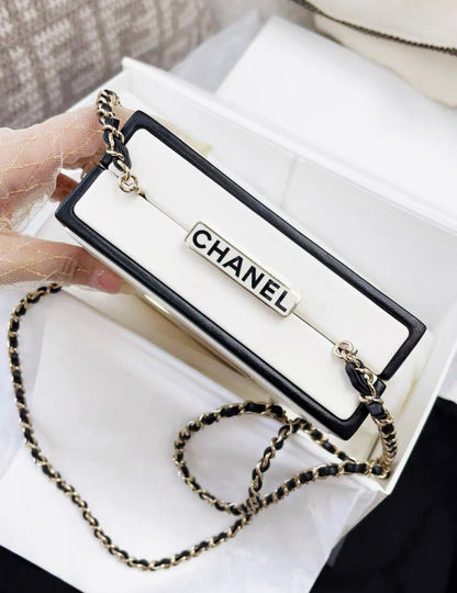 CHANEL 21SS A LIMITED EDITION WHITE & BLACK LEATHER CHANEL NO. 5 PARFUM BOX CLUTCH