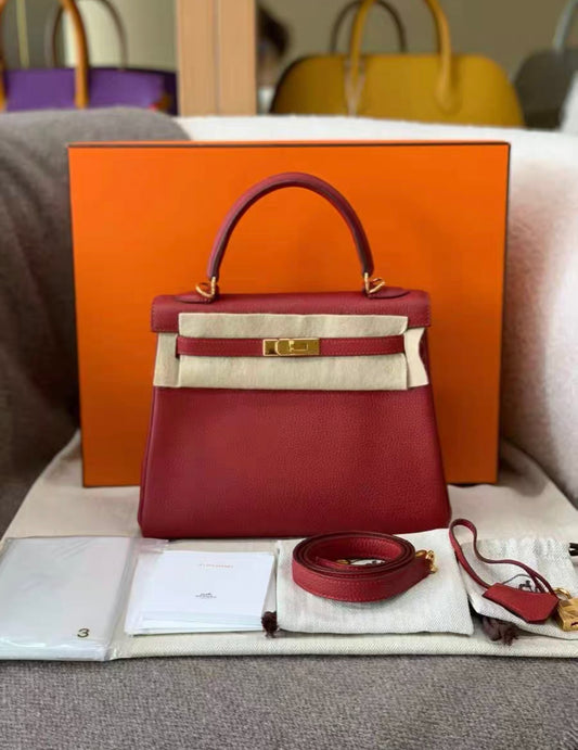 HERMES KELLY 25 RETOURNE ROUGE VIF TOGO GOLD HARDWARE