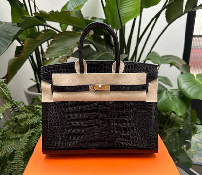 Hermès Birkin 25 Black Shiny Porosus Crocodile Gold Hardware
