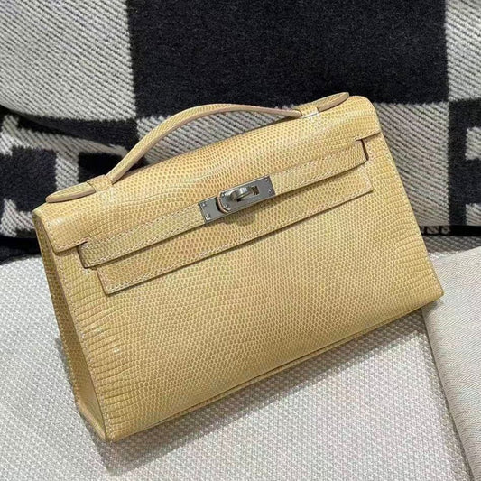 Hermès Kelly Pochette poussiere lizard palladium hardware
