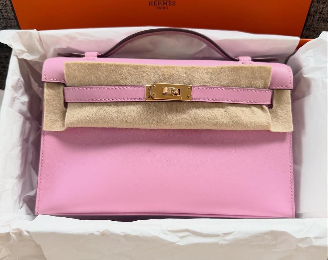 Hermès Kelly pochette Mauve Sylvester Swift Rose gold hardware