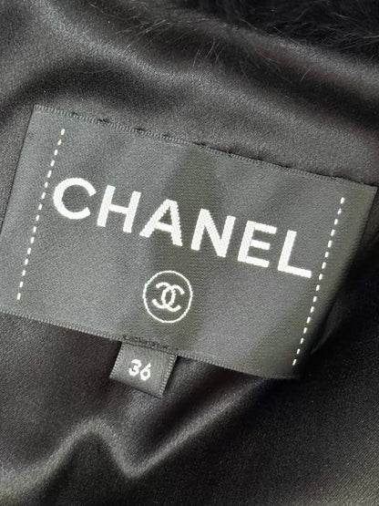 Chanel Fall/Winter 2021 black and white fur vest jacket