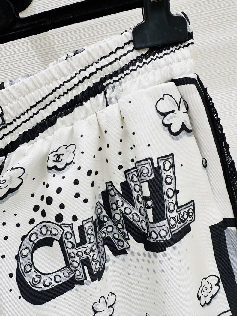 Chanel 25b wide-leg trousers in printed silk