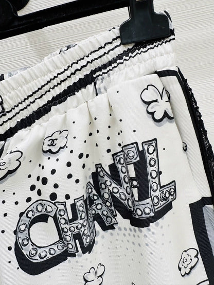 Chanel 25b wide-leg trousers in printed silk