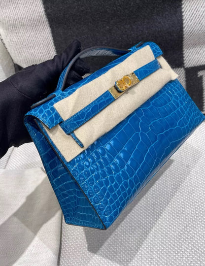 Hermès Kelly Pochette Blue Izmir Shiny Alligator Gold Hardware
