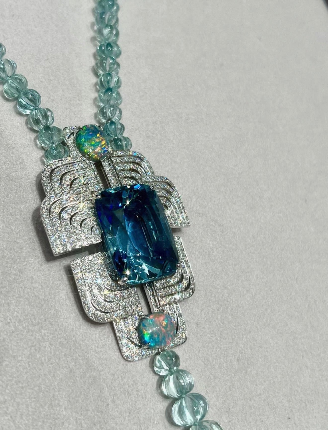 Cartier High Jewelry Necklace - Main stone: 37-carat aquamarine; two opals; chain beads: topaz.