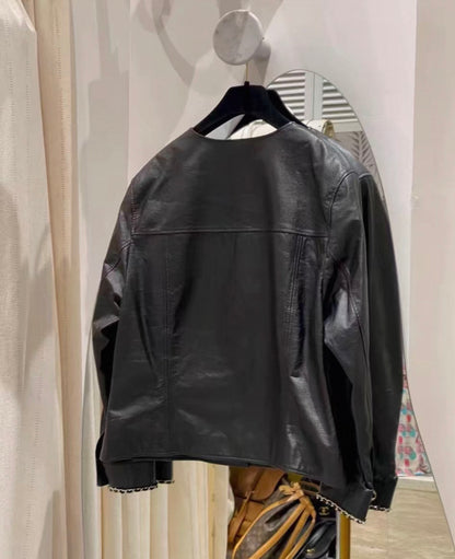 Chanel 24B black leather jacket with chain