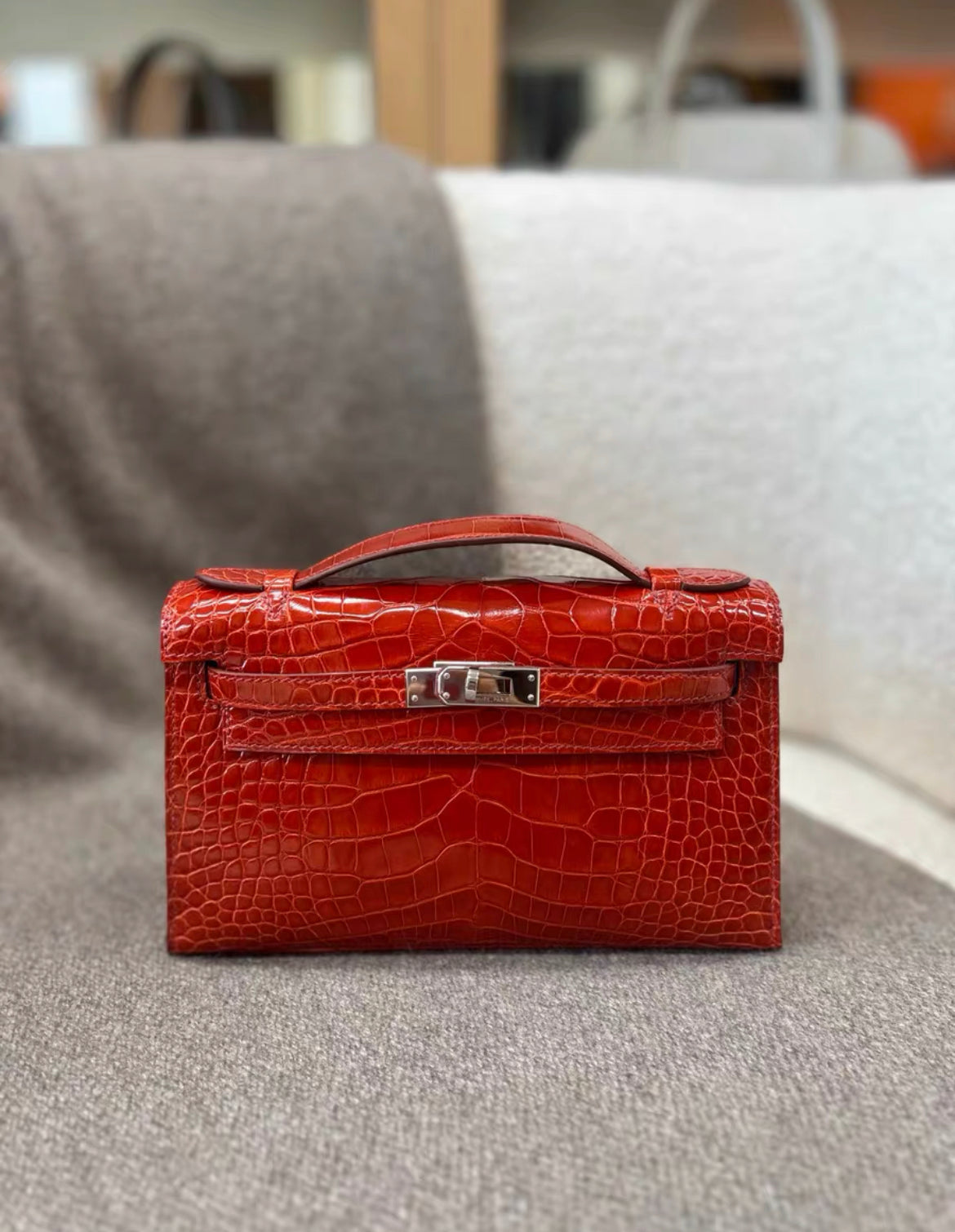 Hermès Kelly Pochette Braise Red Shiny Alligator Palladium