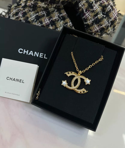 Chanel 24C gold shooting star double C necklace