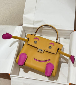Hermes Kelly Doll Curry / Magnolia Swift Palladium Hardware