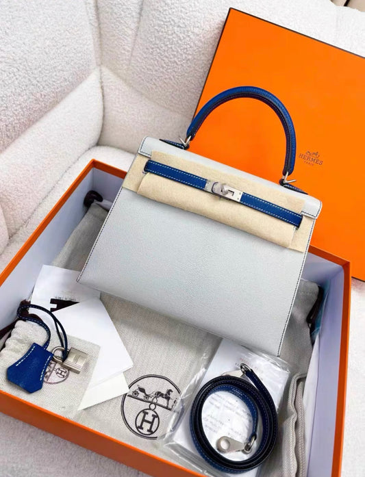 HERMÈS HSS Special Order Kelly 25 handbag in Gris Perle and Blue Saphir Chevre leather with Brushed Palladium hardware