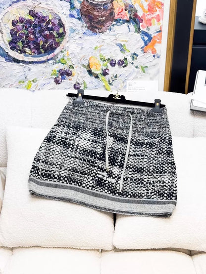 Chanel 16A black and white tweed mini skirt