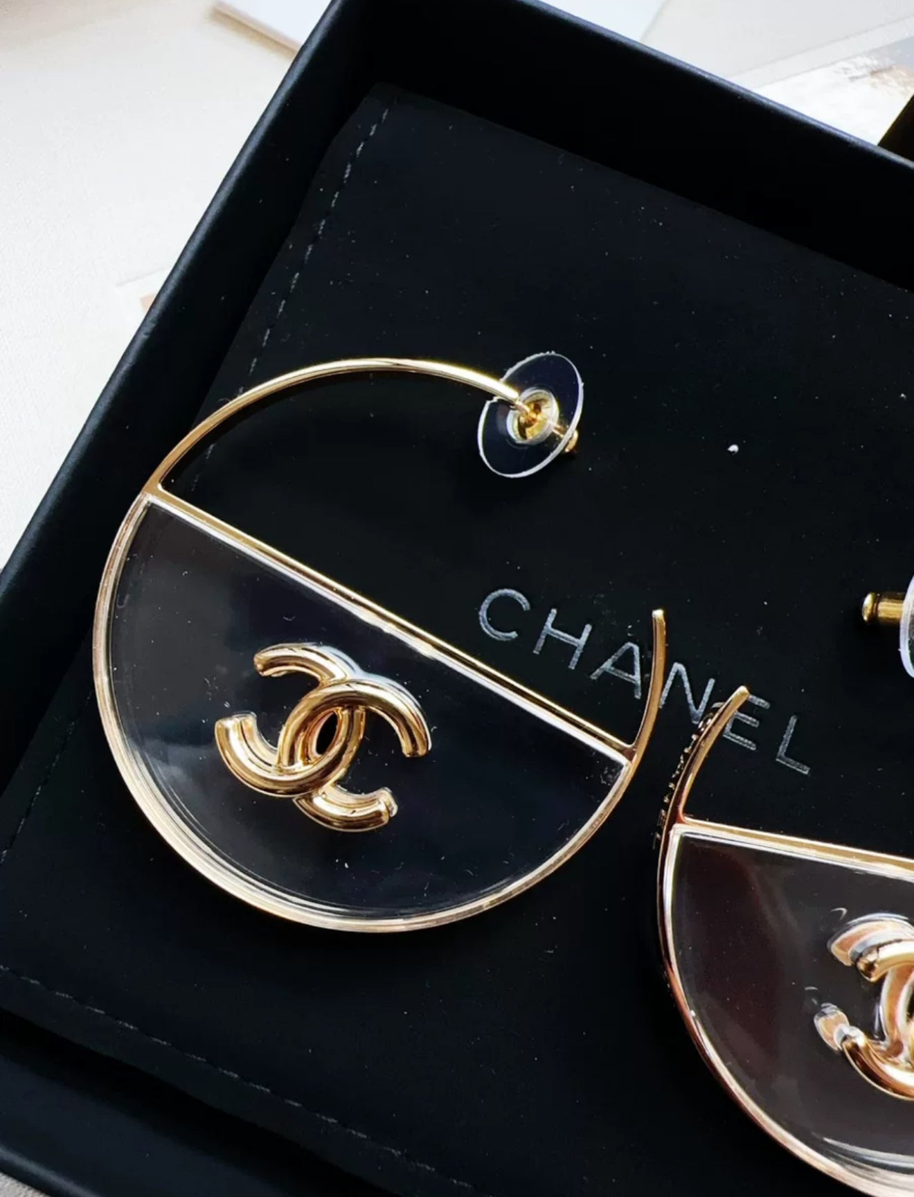 Chanel 23S gold double C transparent acrylic hoop earrings