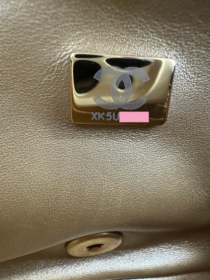 Chanel black mini flap bag with gold hardware