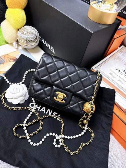 CHANEL 21b classic black and gold ball square bag