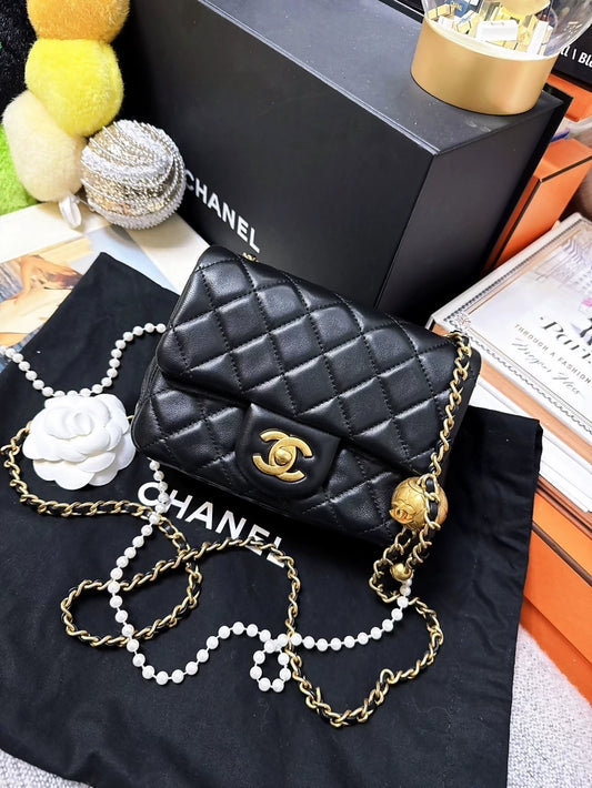 CHANEL 21b classic black and gold ball square bag