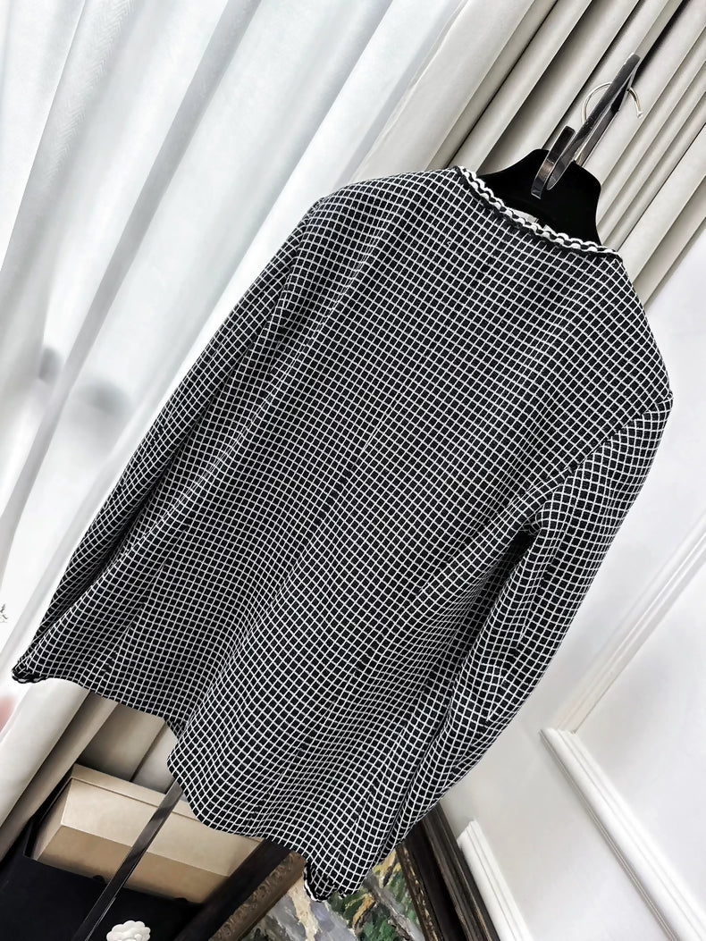 Chanel 25c black and white checkered jacket