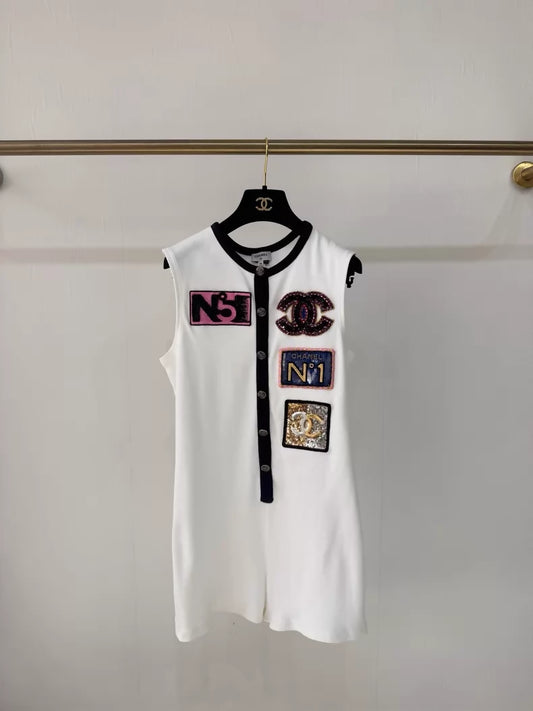 Chanel 23C white sequined embroidered badge jumpsuit