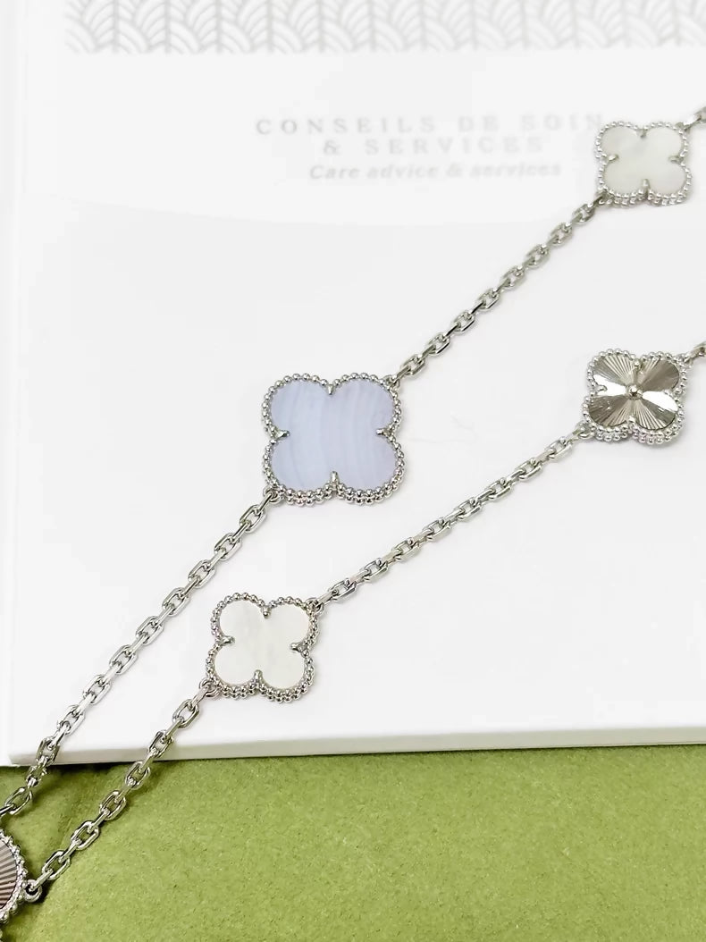 Van Cleef 
Arpels Magic Alhambra long necklace in white gold, mother of pearl and chalcedony