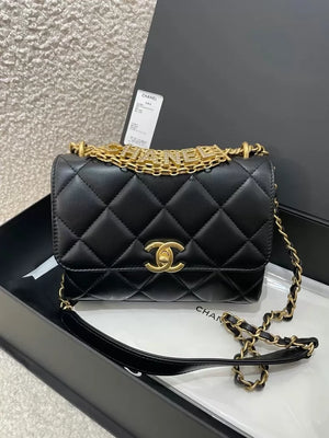 Chanel black and gold lettering rhinestone shoulder bag