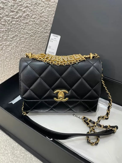 Chanel black and gold lettering rhinestone shoulder bag