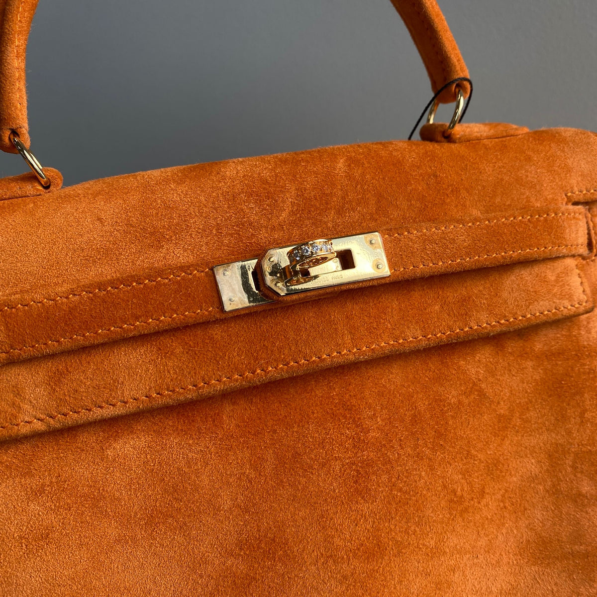 Hermès Kelly 25 Orange Doblis suede leather gold diamond hardware (Extremely rare)