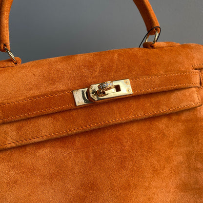 Hermès Kelly 25 Orange Doblis suede leather gold diamond hardware (Extremely rare)