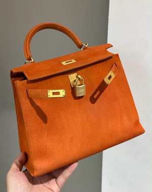Hermes Kelly 25 Orange Doblis Suede Leather gold hardware