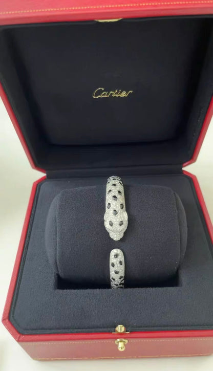 PANTHÈRE DE CARTIER BRACELET
White gold, emeralds, onyx, diamonds size 18